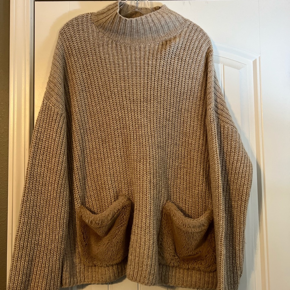 Oversized sweater with fur pockets. Super comfy. Size L